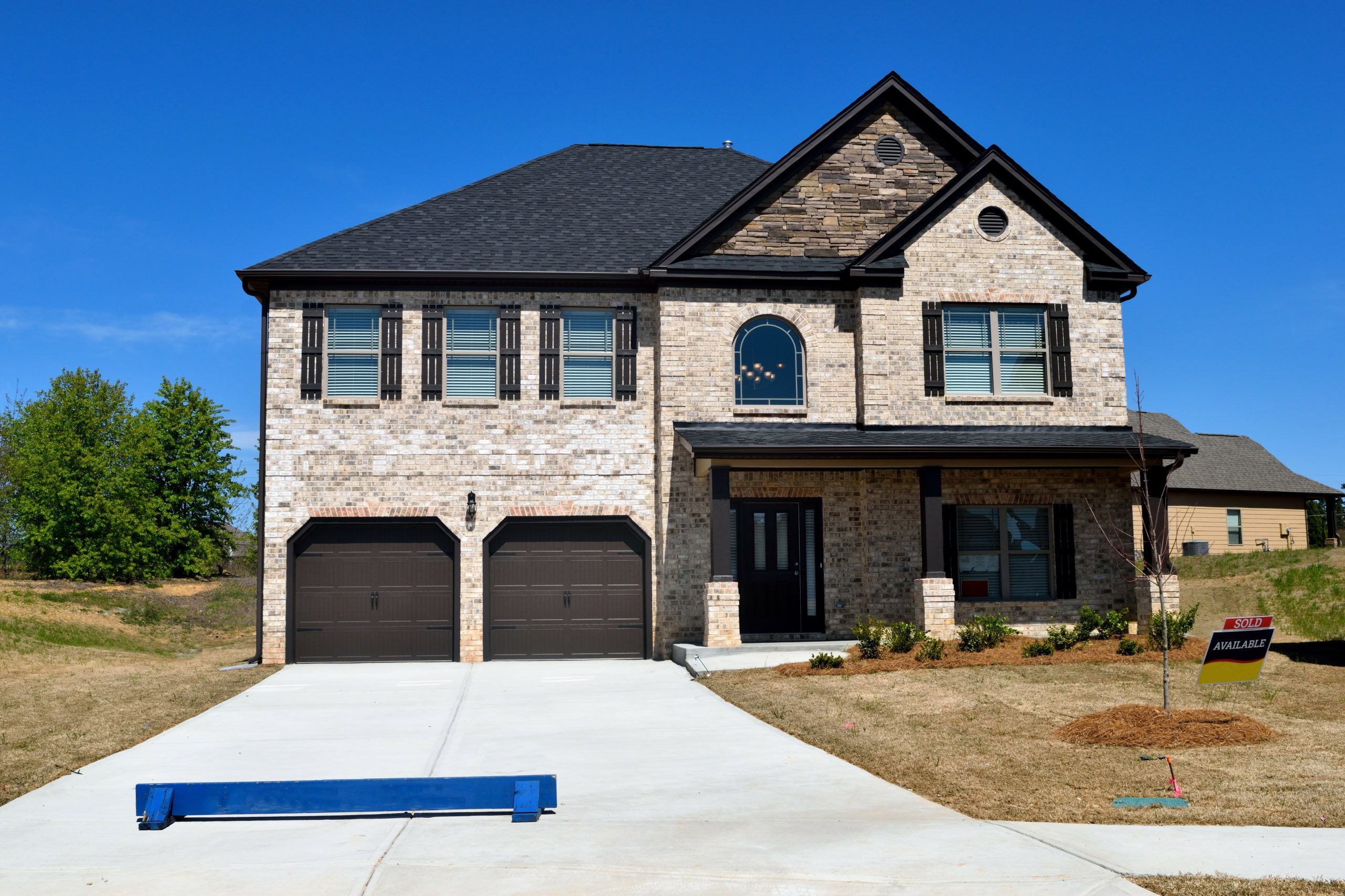 Brick Home With Black Asphalt Roof in Pantego, TX